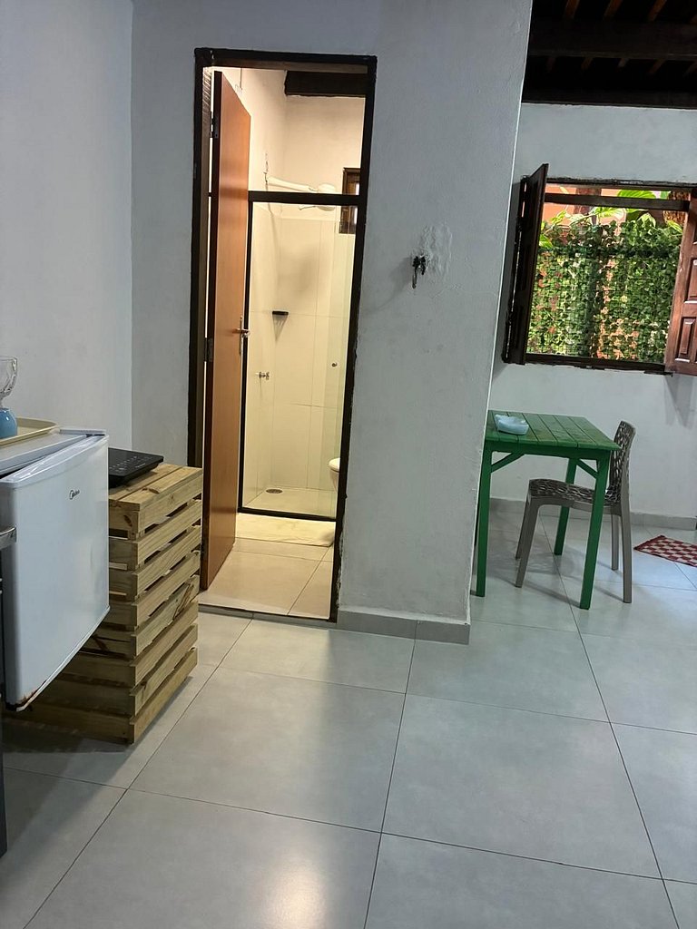 Apartamento 04 - Sala e cozinha, quarto superior com escadas