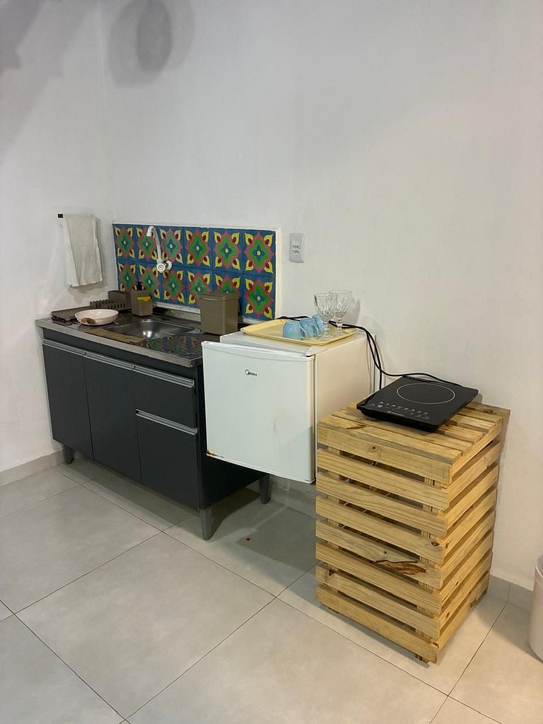 Apartamento 04 - Sala e cozinha, quarto superior com escadas