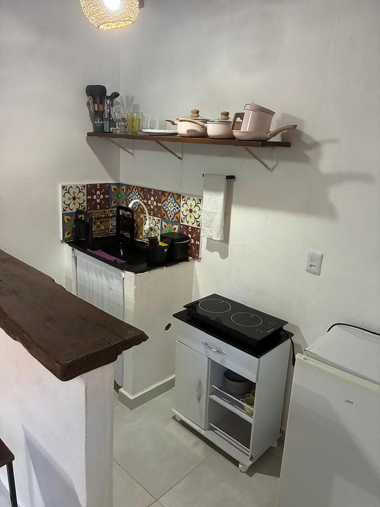 Apartamento 06 sala e cozinha com quarto superior com escada